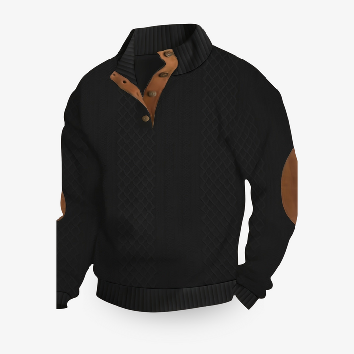 Pull beige en maille torsadée avec coudières en cuir