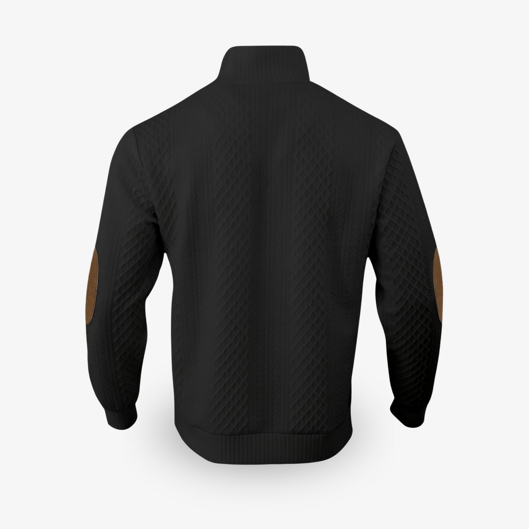 Pull beige en maille torsadée avec coudières en cuir