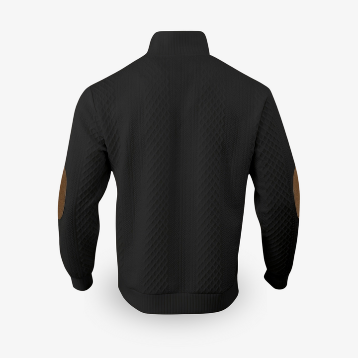 Pull beige en maille torsadée avec coudières en cuir