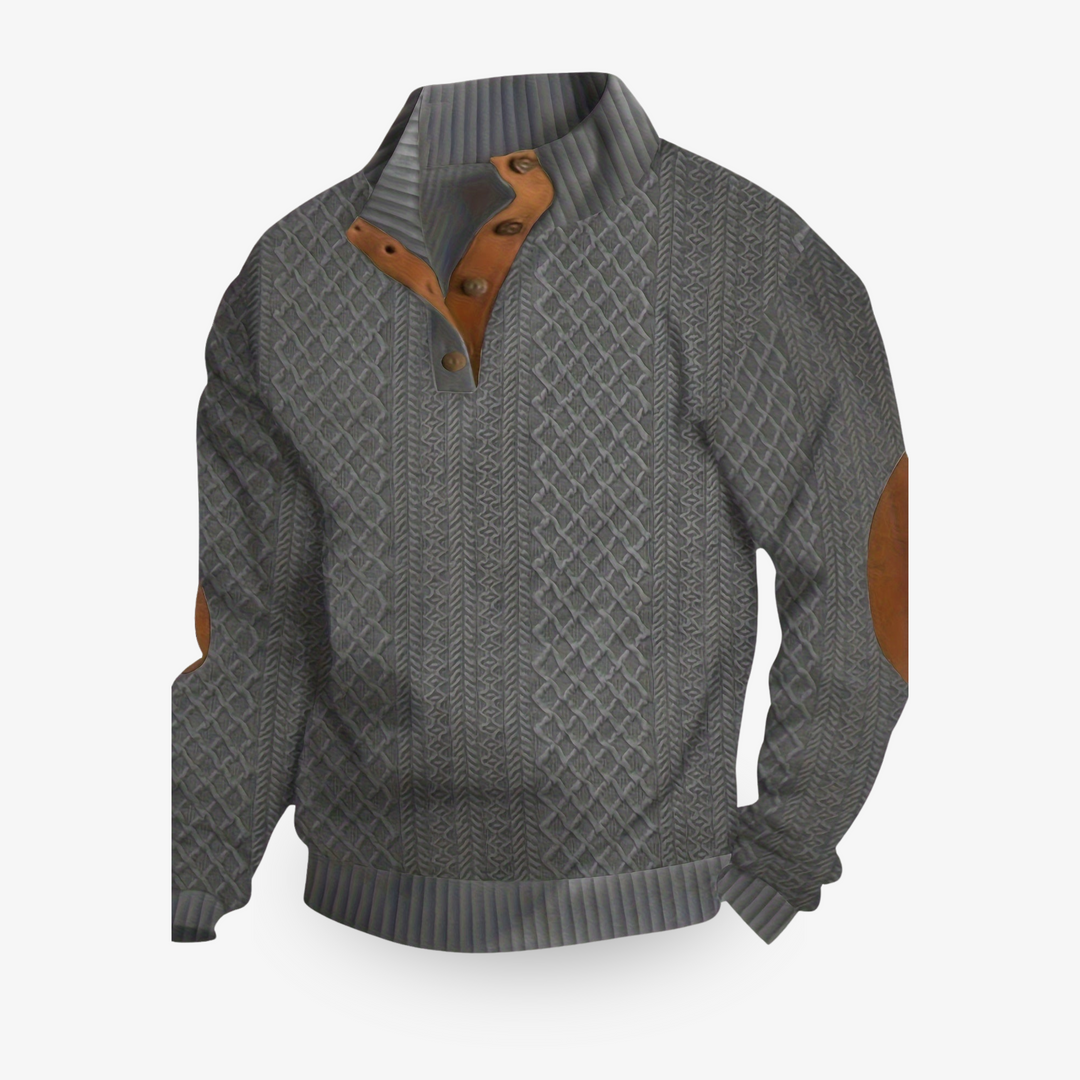 Pull beige en maille torsadée avec coudières en cuir