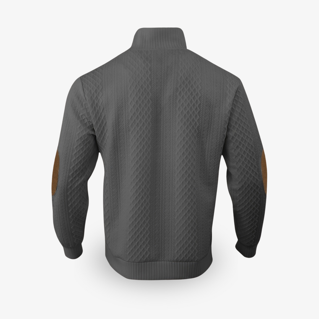 Pull beige en maille torsadée avec coudières en cuir