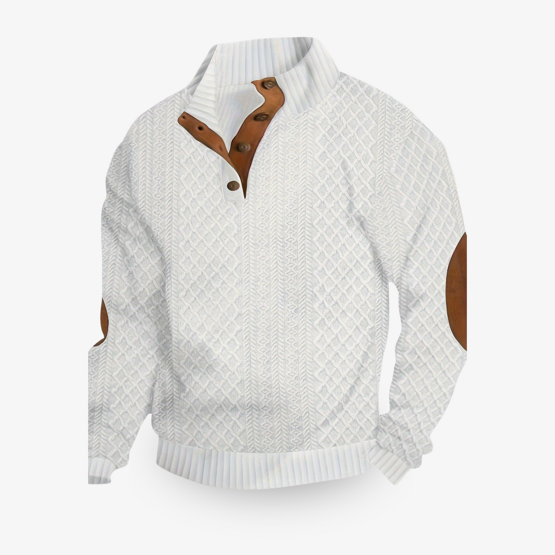 Pull beige en maille torsadée avec coudières en cuir