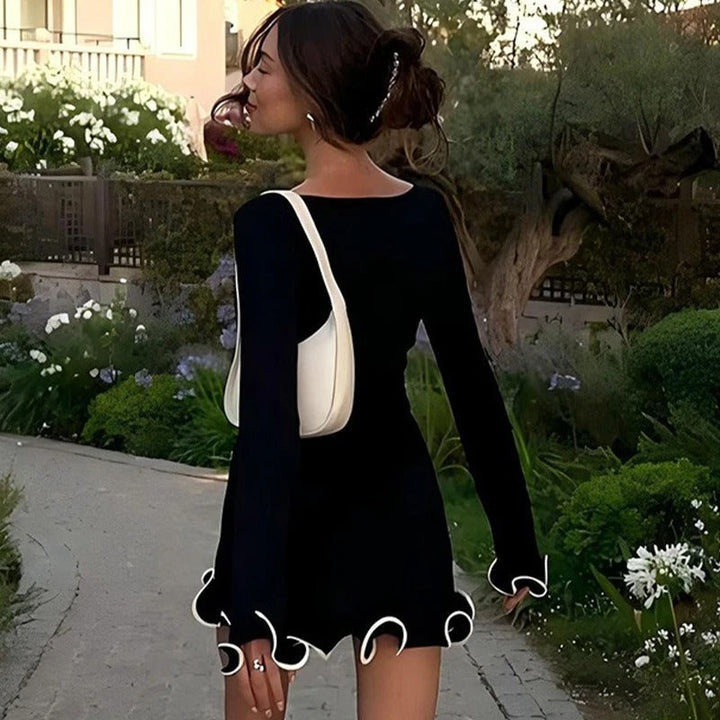 Vestido mini elegante con volantes y mangas largas
