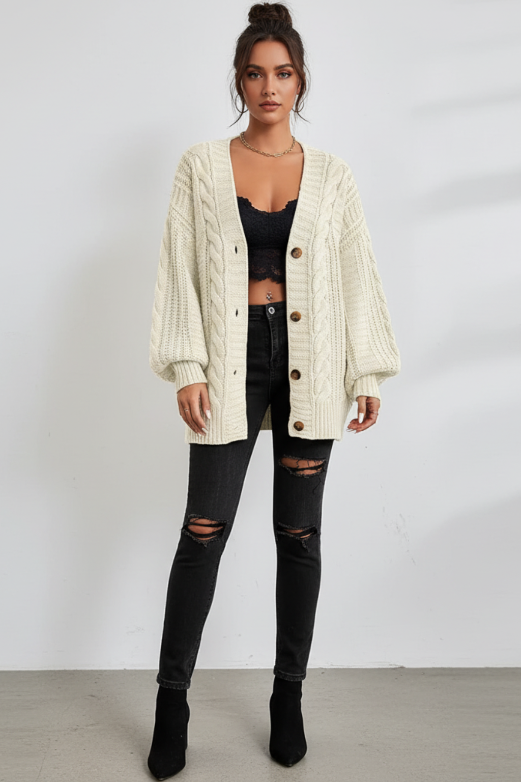 Γυναικεία oversized ζακέτα με πλέξη κοτσίδα