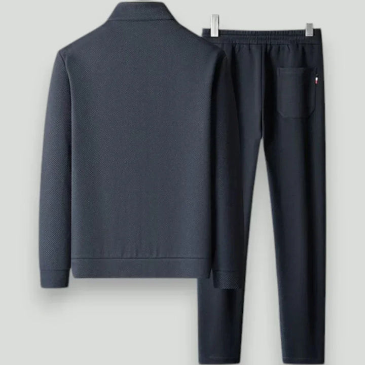 Conjunto deportivo de hombre con chaqueta con cremallera y pantalones jogger