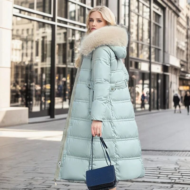 Winnie - Long manteau d’hiver pour femme avec capuche bordée de fausse fourrure