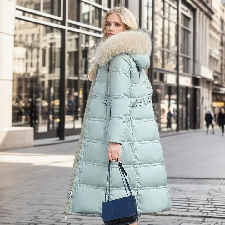 Winnie - Long manteau d’hiver pour femme avec capuche bordée de fausse fourrure